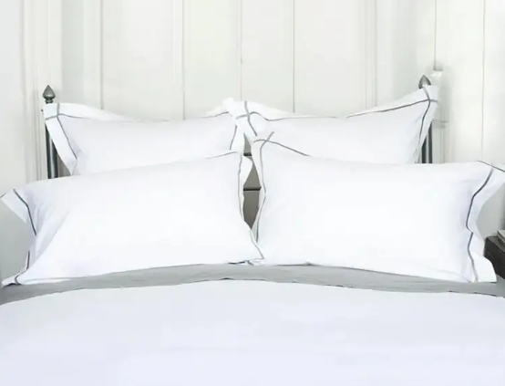 Wat kan ik doen als de satige sateenbladen van mijn hotel geel worden en stijver worden met elke wasbeurt?